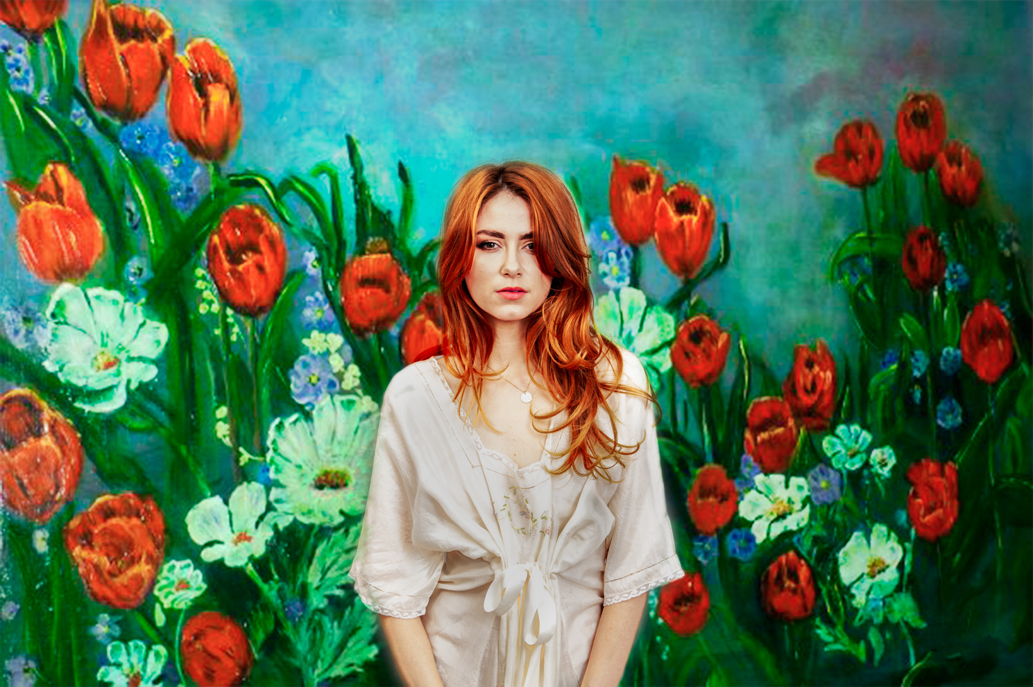 Fine art portrait of a red head model surrounded by wild flowers by Farnham, Surrey based fashion photographer James Muller