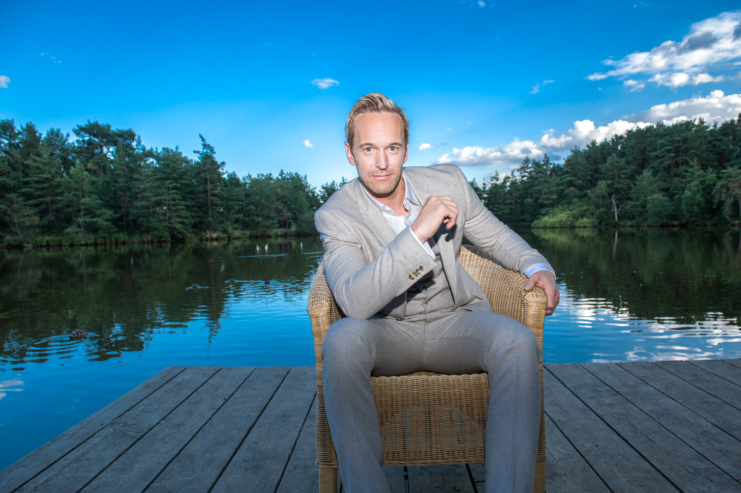 Man by the lake. Wedding photography by Farnham, Surrey based portrait and fashion photographer James Muller