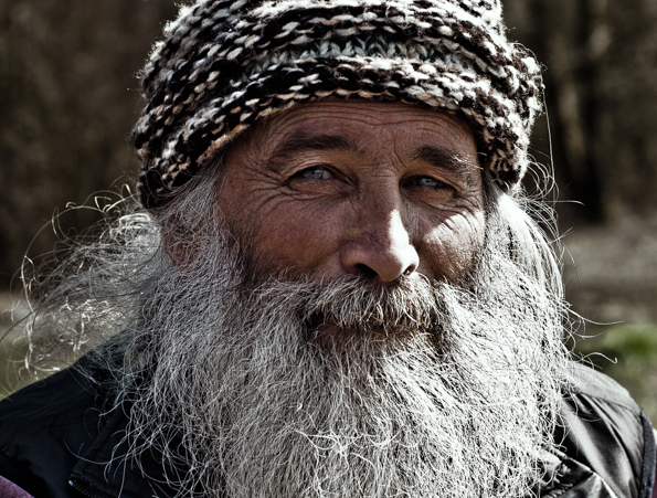 The eyes say it best. Old, wrinkly, bearded man portrait by Farnham, Surrey based fashion photographer James Muller